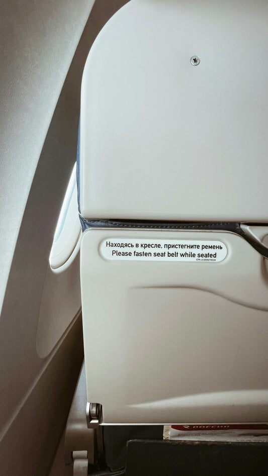 white car seat with white cover