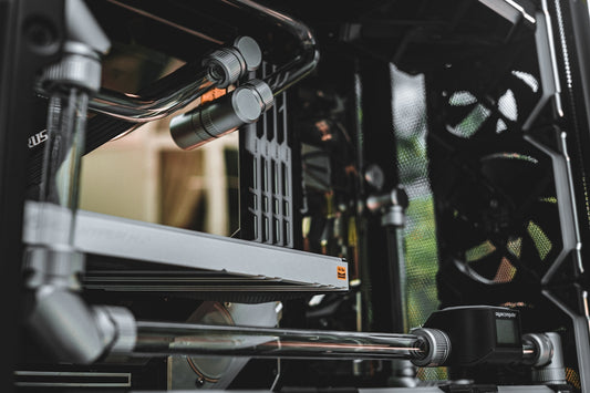 a close up of a computer case with a fan