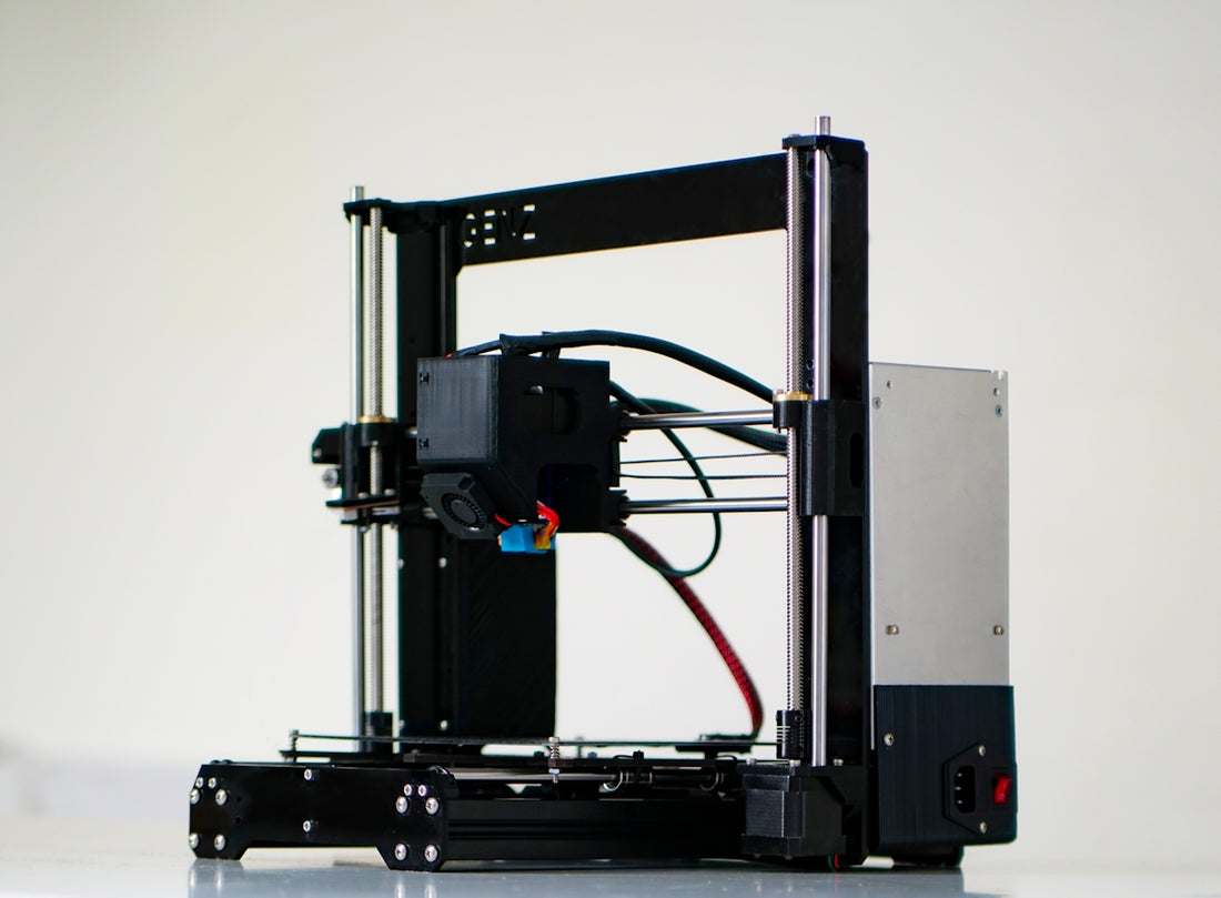a 3d printer with wires attached to it