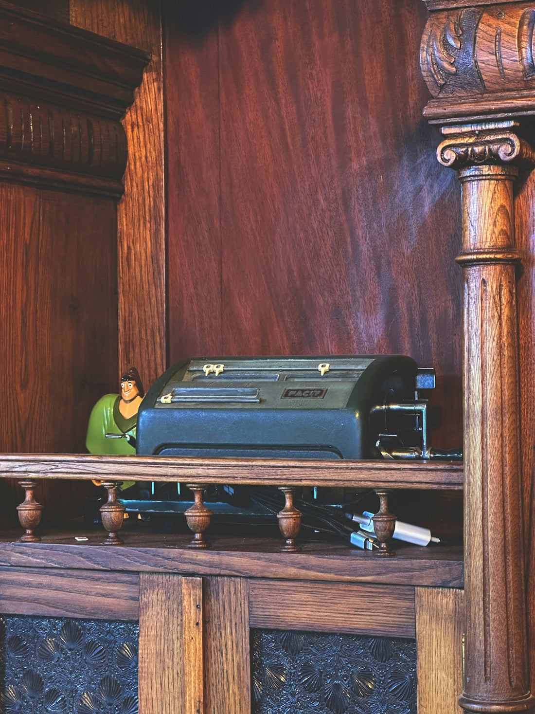 A model train set on a wooden shelf