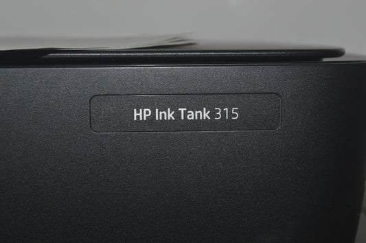 A close up of a hp ink tank