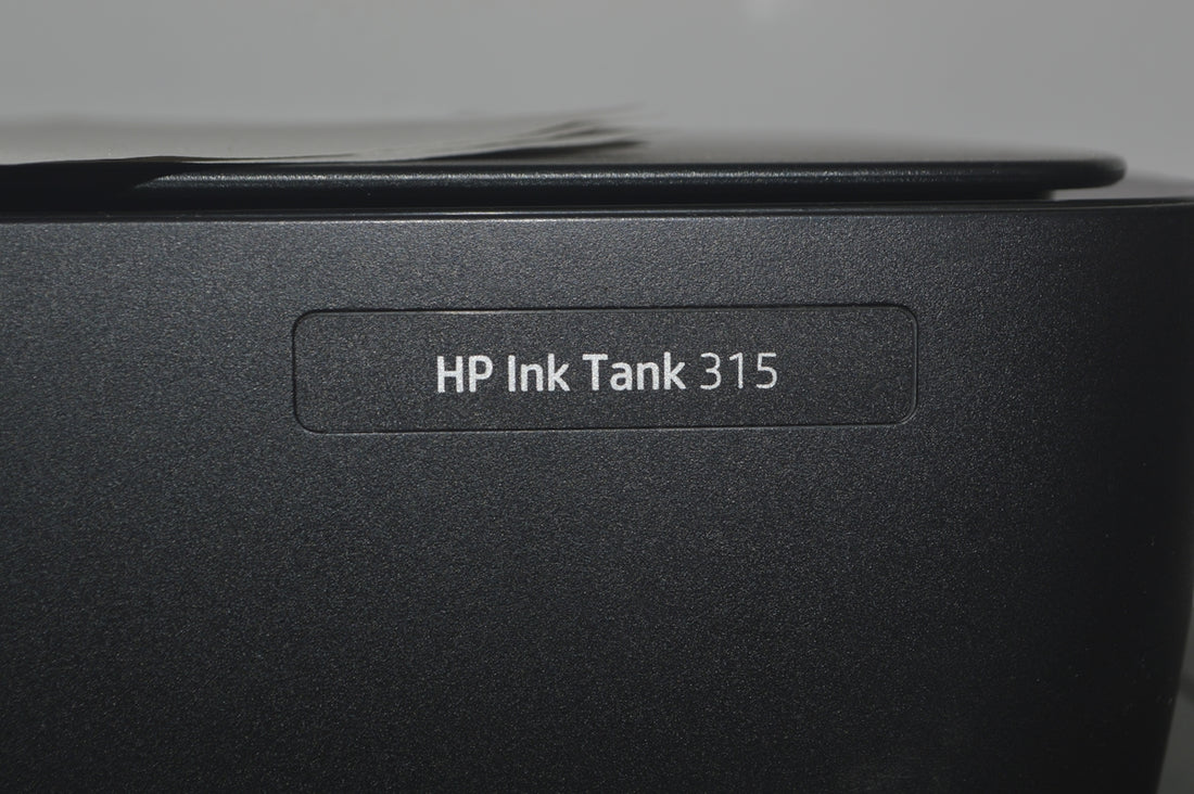 A close up of a hp ink tank