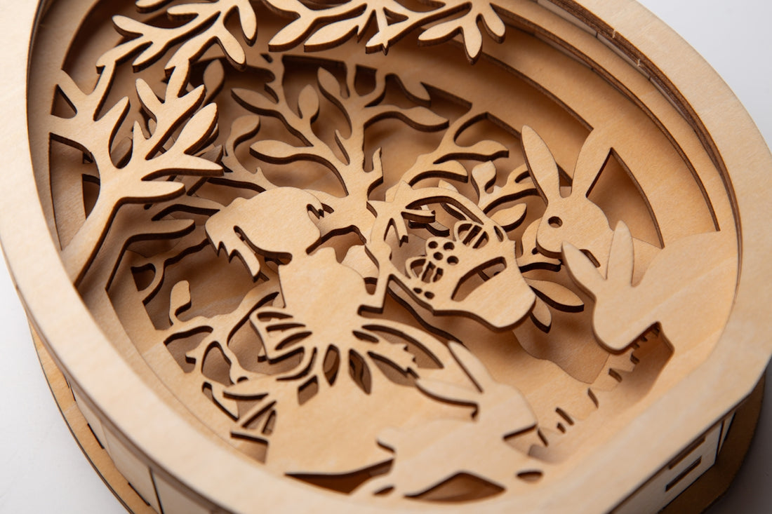 Alice and the white rabbit carved from wood.