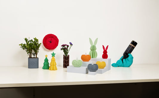Several colorful decorations are displayed on a counter.