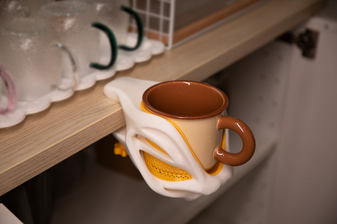 A mug rests on a unique shelf design.