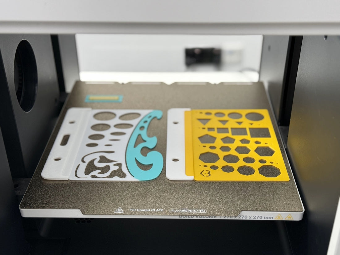 Two stencils for drawing shapes on a printer bed